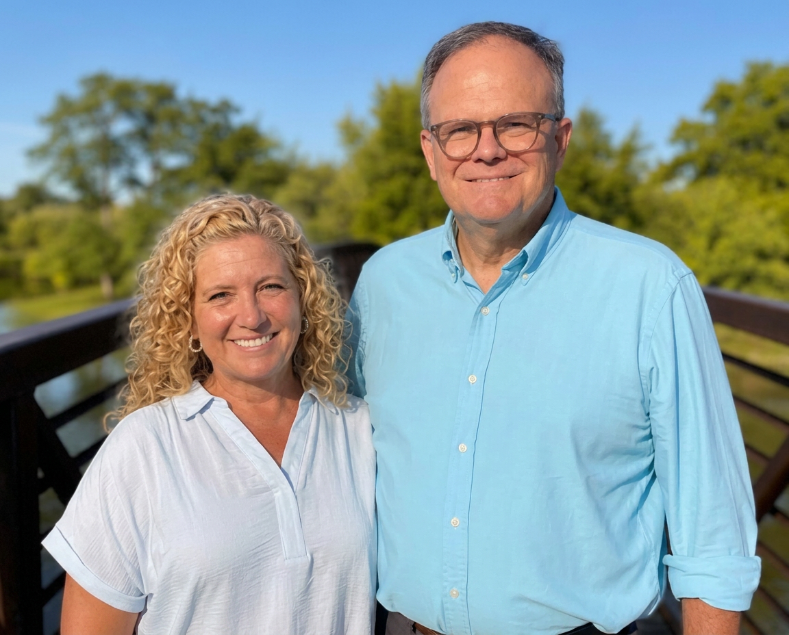 Keith Dennen with his wife on a bridge over Old Hickory Lake