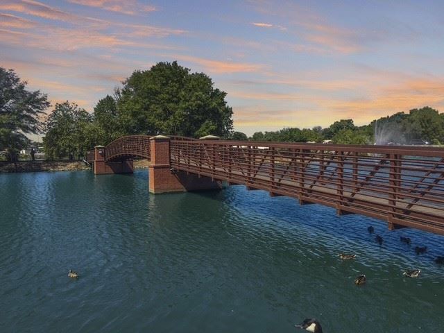 Pedestrian bridge over the lake in Hendersonville, Tennessee at sunset